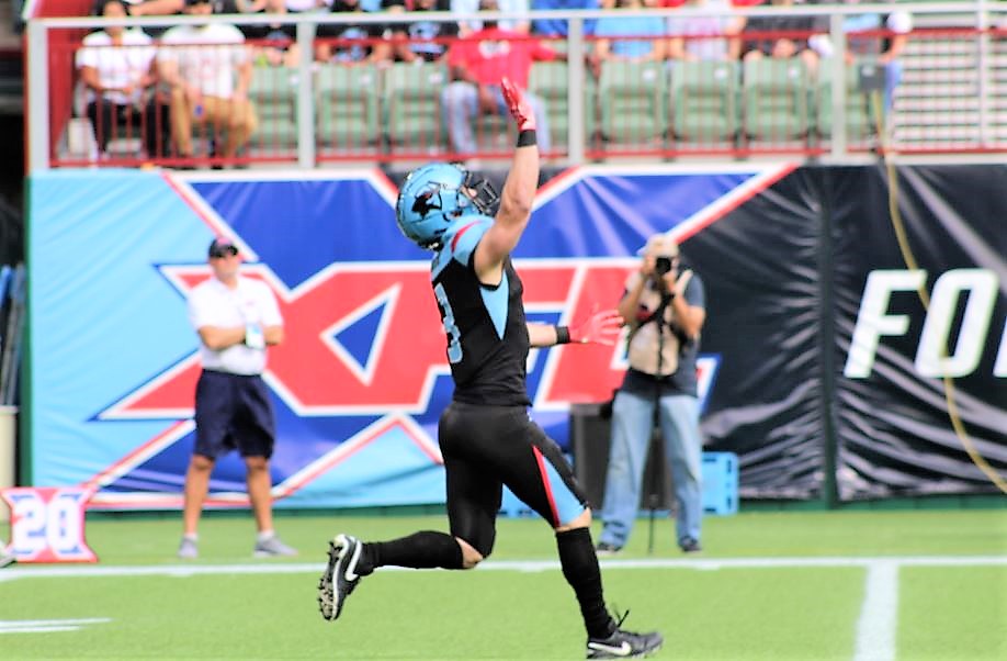 Nagel calls for a fair catch after the Renegades stopped the Roughnecks early in the game.